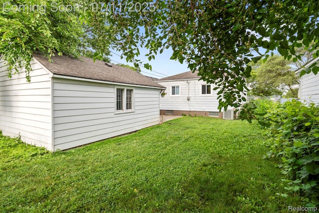 24528 Schroeder Ave, Eastpointe, MI 48021 - view of green lawn featuring an outdoor structure