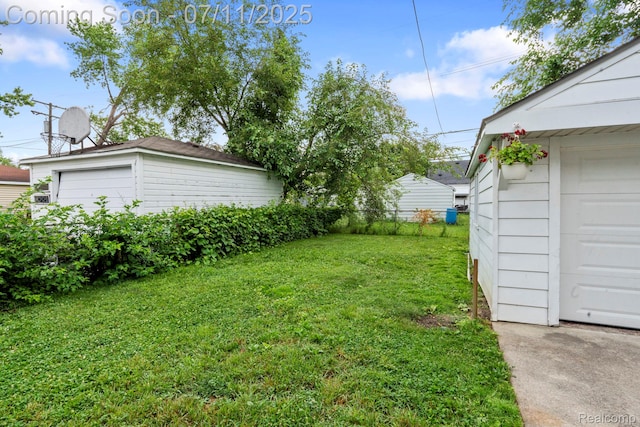 24528 Schroeder Ave, Eastpointe, MI 48021 - view of yard featuring an outbuilding and a garage