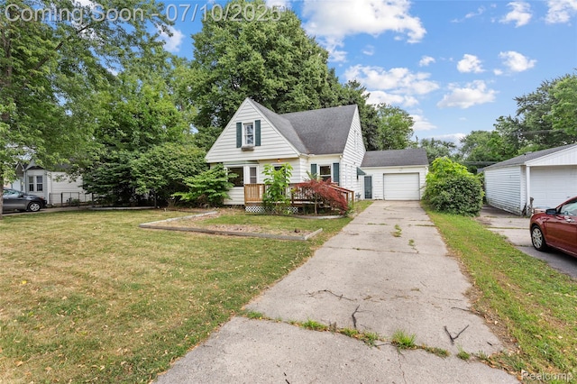 18930 Deering St, Melvindale, MI 48152 - view of front facade featuring a deck, an outbuilding, and a detached garage