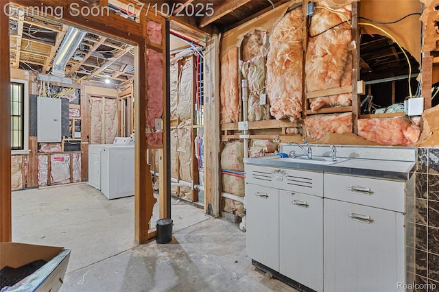 18930 Deering St, Melvindale, MI 48152 - unfinished basement featuring washing machine and dryer and electric panel