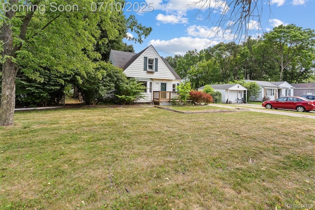 18930 Deering St, Melvindale, MI 48152 - view of front of property with a wooden deck and a front yard