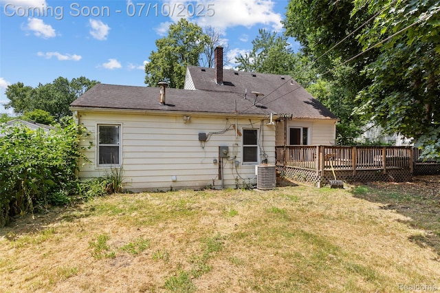 18930 Deering St, Melvindale, MI 48152 - back of property with a wooden deck, a lawn, and a shingled roof