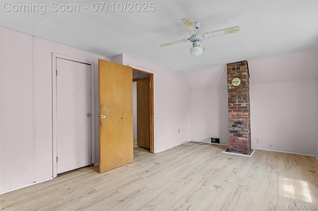 18930 Deering St, Melvindale, MI 48152 - unfurnished bedroom featuring light wood-style flooring, ceiling fan, and vaulted ceiling