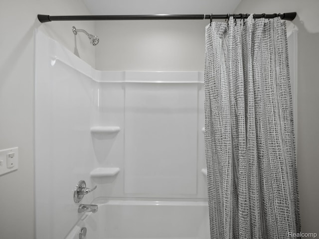 16257 Rogan Dr, Linden, MI 48451 - bathroom featuring shower / bath combination with curtain