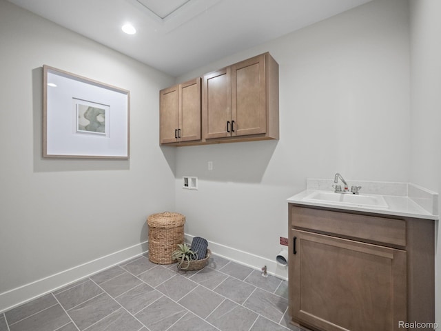16257 Rogan Dr, Linden, MI 48451 - washroom with cabinet space, washer hookup, and recessed lighting