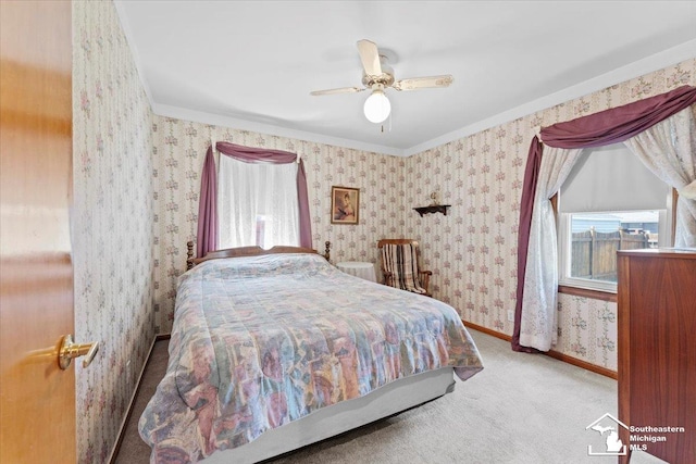 1508 12th St, Wyandotte, MI 48192 - carpeted bedroom with crown molding, wallpapered walls, and a ceiling fan