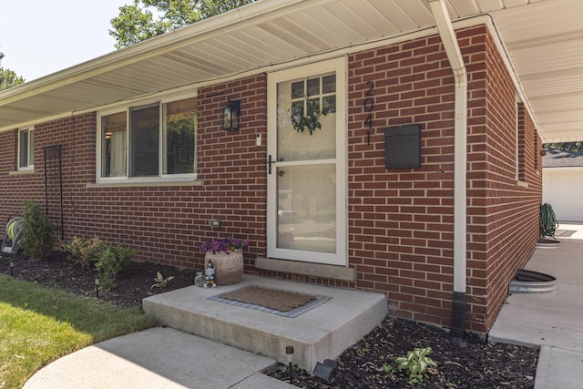 2041 Norfolk Ave, Ann Arbor, MI 48103 - property entrance featuring brick siding and a garage