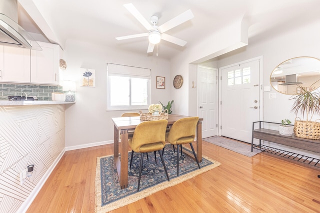 2041 Norfolk Ave, Ann Arbor, MI 48103 - dining space featuring light wood finished floors, healthy amount of natural light, and a ceiling fan