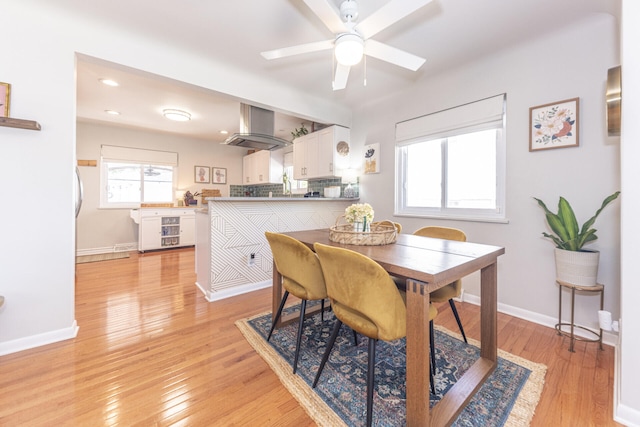 2041 Norfolk Ave, Ann Arbor, MI 48103 - dining space with ceiling fan and light wood-style floors