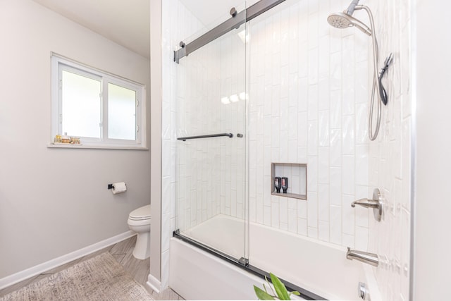 2041 Norfolk Ave, Ann Arbor, MI 48103 - full bathroom featuring shower / bath combination with glass door and baseboards