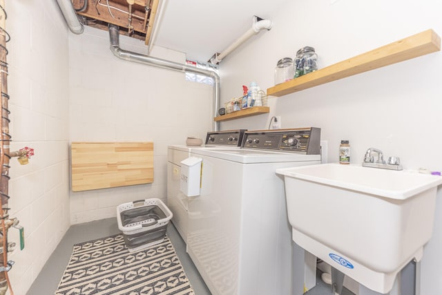 2041 Norfolk Ave, Ann Arbor, MI 48103 - washroom with washing machine and dryer and a sink