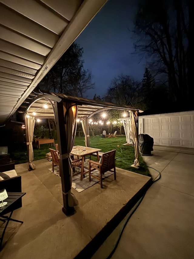 2041 Norfolk Ave, Ann Arbor, MI 48103 - patio at twilight with a gazebo, a patio area, a lawn, and grilling area