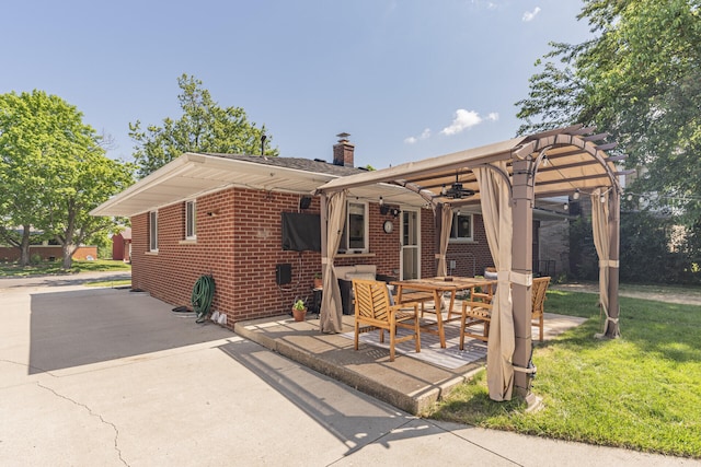 2041 Norfolk Ave, Ann Arbor, MI 48103 - view of front of property featuring a chimney, a patio, brick siding, and a pergola