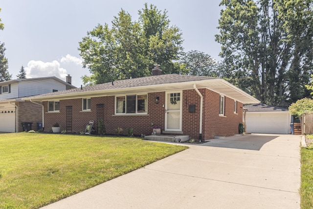 2041 Norfolk Ave, Ann Arbor, MI 48103 - split level home with brick siding, a chimney, a front yard, an outdoor structure, and a detached garage