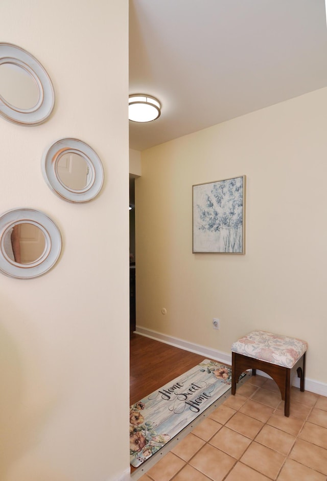 609 Watersedge Dr, Ann Arbor, MI 48105 - foyer entrance featuring baseboards and light wood-style floors