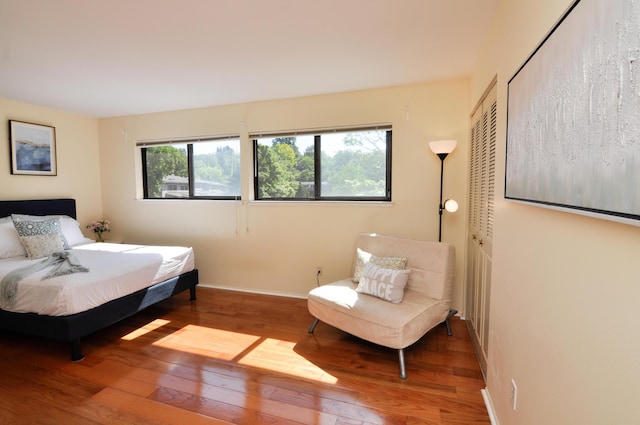 609 Watersedge Dr, Ann Arbor, MI 48105 - bedroom featuring hardwood / wood-style flooring and a closet