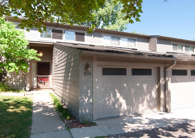 609 Watersedge Dr, Ann Arbor, MI 48105 - view of front of property featuring concrete driveway and an attached garage