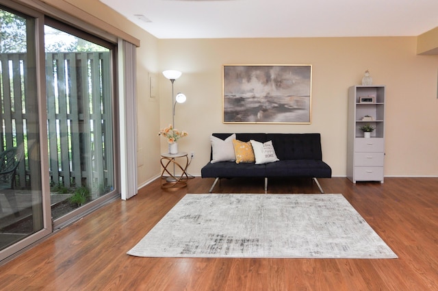 609 Watersedge Dr, Ann Arbor, MI 48105 - sitting room featuring wood finished floors and baseboards