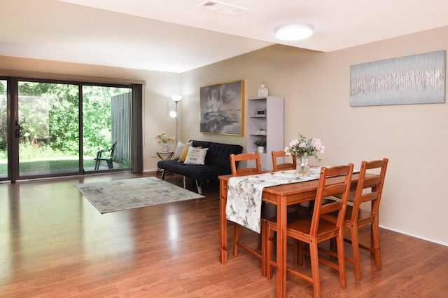 609 Watersedge Dr, Ann Arbor, MI 48105 - dining space featuring wood finished floors and baseboards