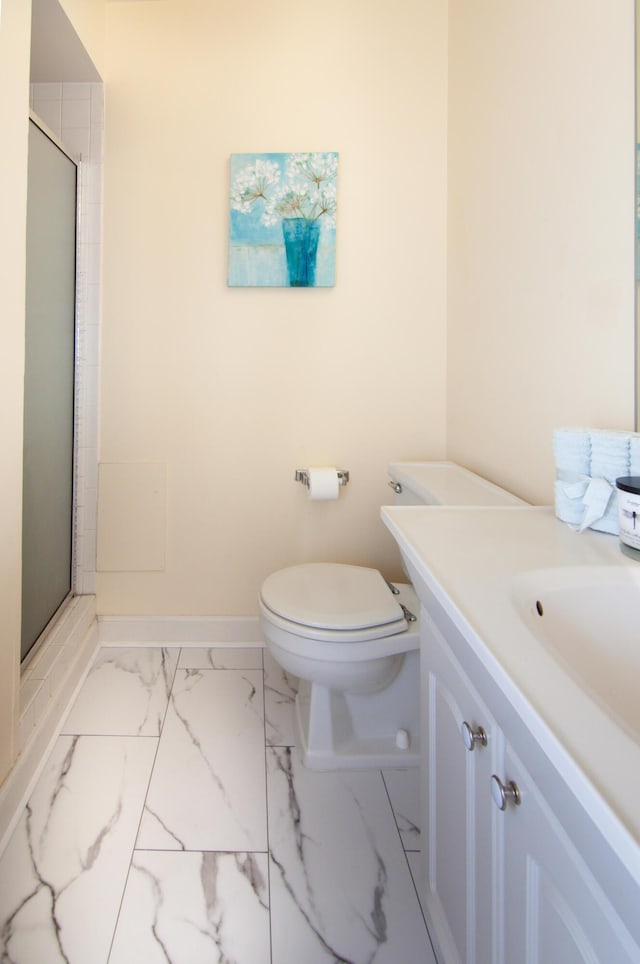 609 Watersedge Dr, Ann Arbor, MI 48105 - bathroom with marble look tile flooring, a shower stall, and vanity