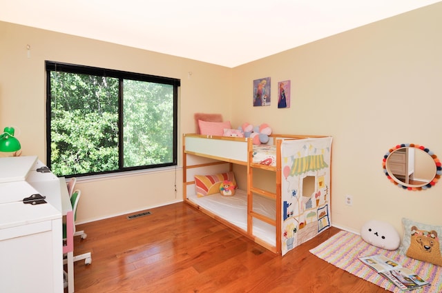 609 Watersedge Dr, Ann Arbor, MI 48105 - bedroom featuring wood finished floors and baseboards