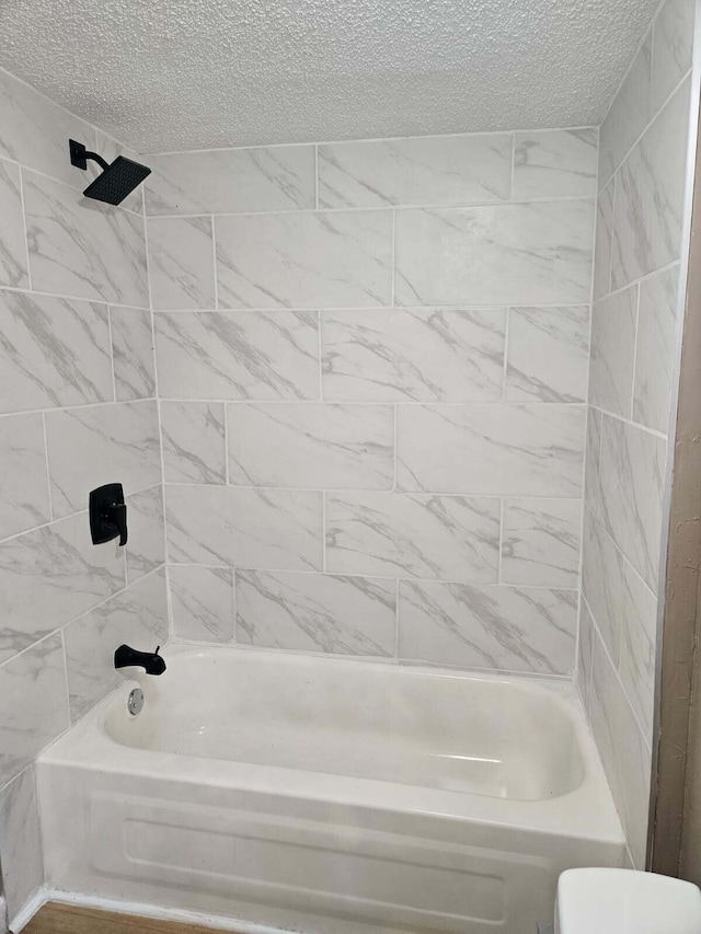 4084 Seneca St, Weston, MI 49289 - full bathroom featuring a textured ceiling and bathing tub / shower combination