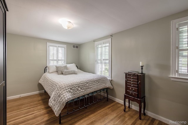 3070 Old Orchard Dr, Waterford, MI 48328 - bedroom with wood finished floors and baseboards