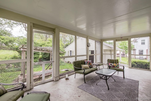 3070 Old Orchard Dr, Waterford, MI 48328 - sunroom featuring an outdoor living space and healthy amount of natural light
