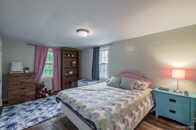 3070 Old Orchard Dr, Waterford, MI 48328 - bedroom with wood finished floors and multiple windows