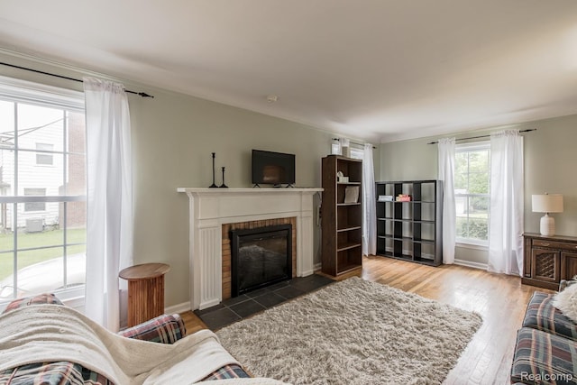 3070 Old Orchard Dr, Waterford, MI 48328 - living room featuring a fireplace and wood finished floors