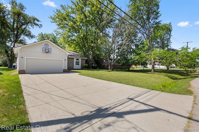 2930 Wisconsin Rd, Troy, MI 48083 - view of front of home with concrete driveway, a front lawn, an attached garage, and brick siding