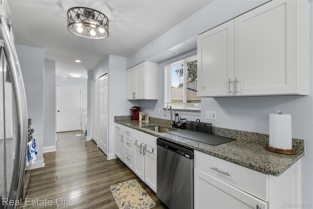 2930 Wisconsin Rd, Troy, MI 48083 - kitchen featuring stainless steel dishwasher, white cabinetry, dark wood-style floors, dark stone countertops, and recessed lighting