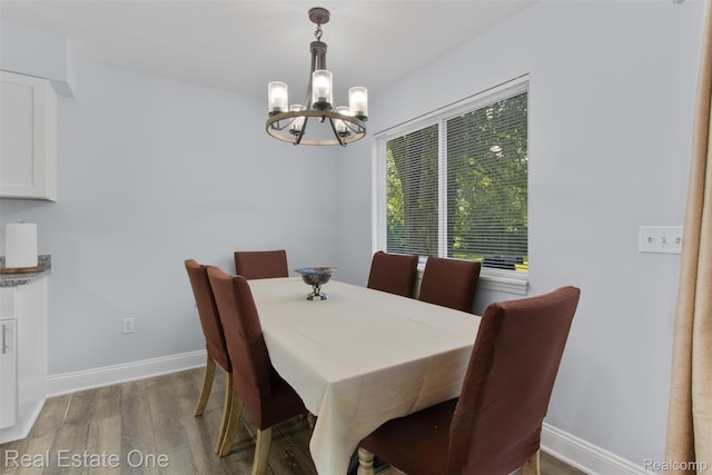 2930 Wisconsin Rd, Troy, MI 48083 - dining space featuring a chandelier and wood finished floors