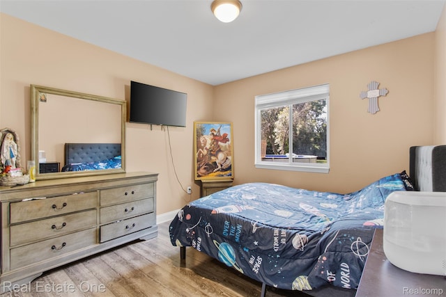 2930 Wisconsin Rd, Troy, MI 48083 - bedroom featuring wood finished floors and baseboards