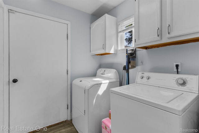 2930 Wisconsin Rd, Troy, MI 48083 - laundry area with separate washer and dryer, cabinet space, and dark wood-type flooring
