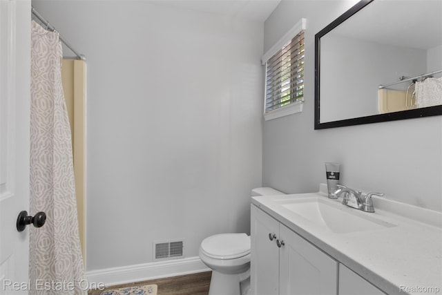 2930 Wisconsin Rd, Troy, MI 48083 - bathroom with vanity, wood finished floors, and a shower with curtain