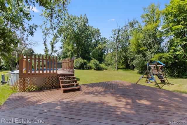 2930 Wisconsin Rd, Troy, MI 48083 - deck featuring a playground and a lawn