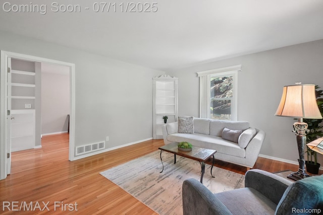 5910 Hillsboro Rd, Davisburg, MI 48350 - living room featuring light wood-type flooring