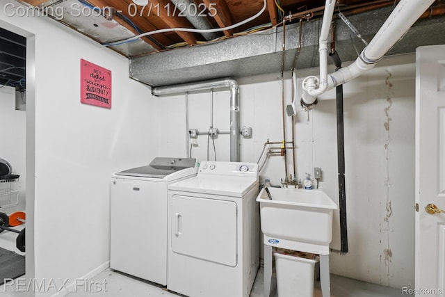 5910 Hillsboro Rd, Davisburg, MI 48350 - washroom with washing machine and dryer