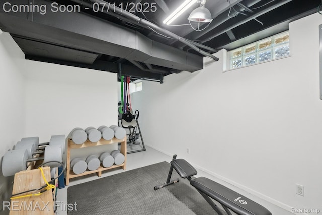 5910 Hillsboro Rd, Davisburg, MI 48350 - workout room featuring baseboards