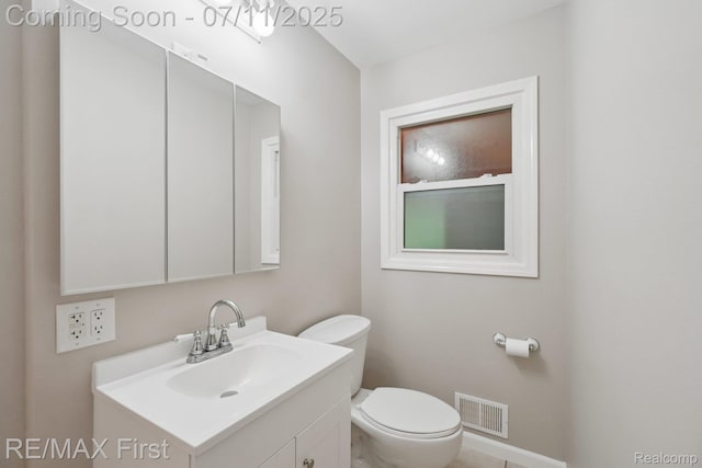 5910 Hillsboro Rd, Davisburg, MI 48350 - half bathroom featuring vanity and toilet