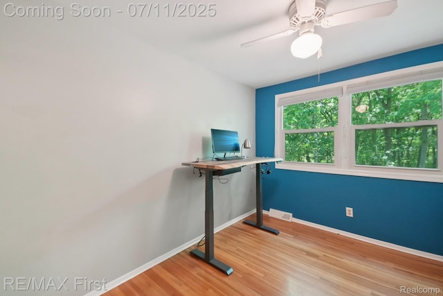 5910 Hillsboro Rd, Davisburg, MI 48350 - unfurnished office with wood finished floors and a ceiling fan