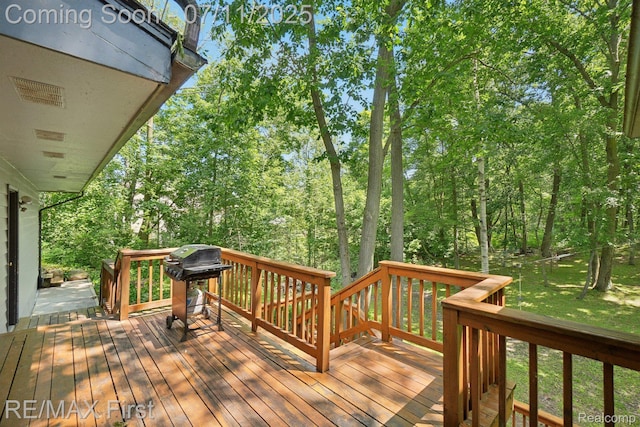 5910 Hillsboro Rd, Davisburg, MI 48350 - wooden terrace with grilling area and a lawn