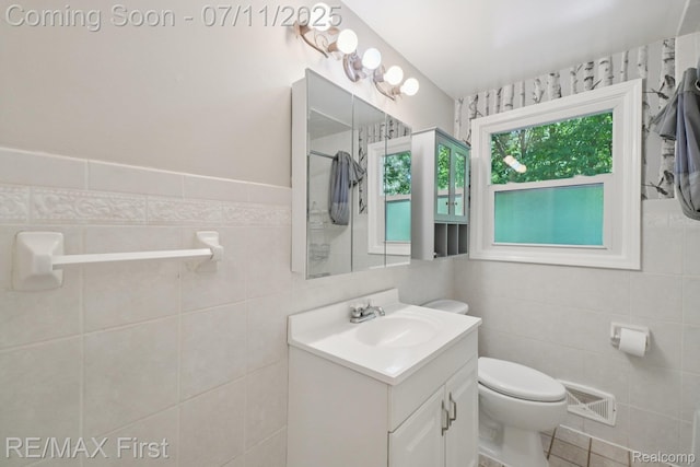 5910 Hillsboro Rd, Davisburg, MI 48350 - bathroom with vanity, tile walls, and a shower