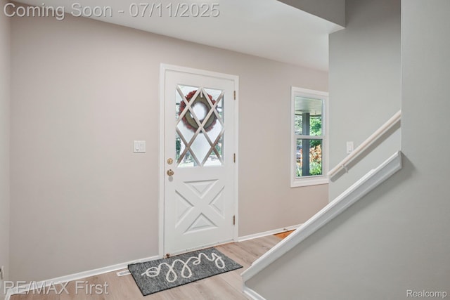 5910 Hillsboro Rd, Davisburg, MI 48350 - entrance foyer with wood finished floors and stairs