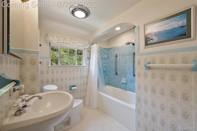 132 Illinois Ave, Pontiac, MI 48341 - bathroom with shower / bath combo with shower curtain, tile walls, tile patterned flooring, and a wainscoted wall