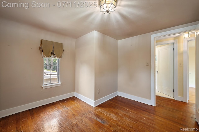 132 Illinois Ave, Pontiac, MI 48341 - spare room with wood-type flooring and baseboards