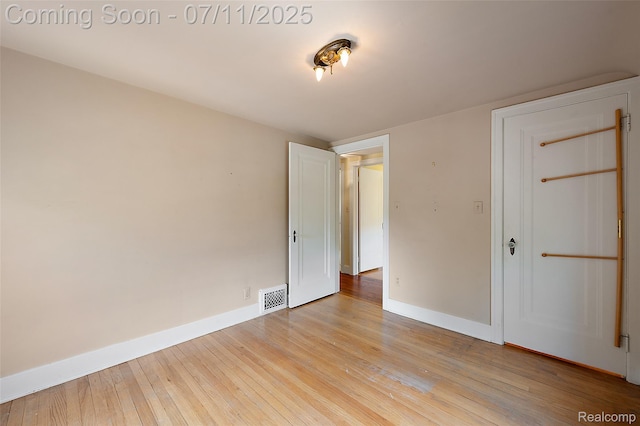 132 Illinois Ave, Pontiac, MI 48341 - unfurnished bedroom with light wood-style flooring and baseboards