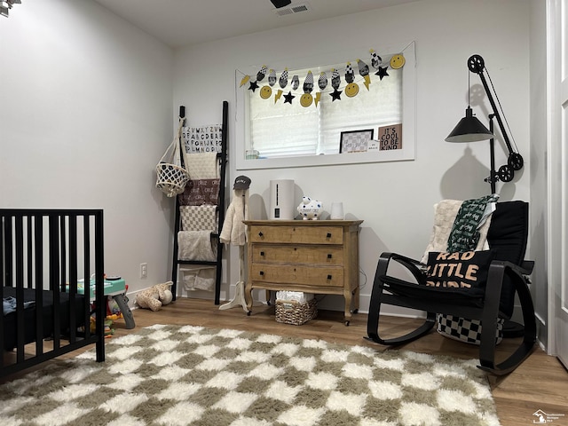 10931 Telegraph Rd, Erie, MI 48133 - bedroom featuring wood finished floors