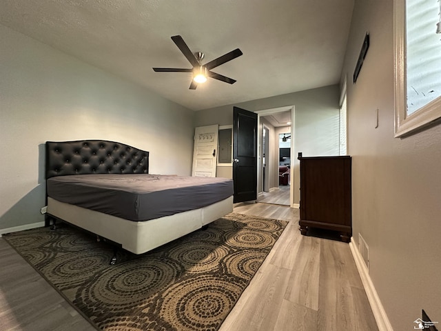 10931 Telegraph Rd, Erie, MI 48133 - bedroom featuring light wood-style floors and ceiling fan